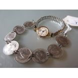 Ladies 9ct gold cased wristwatch (a/f) with plated strap and a silver plated farthing coin bracelet