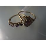 Two 9ct gold amethyst set dress rings