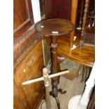 Edwardian mahogany torchère with a dish turned top and tripod base together with a 19th Century