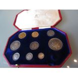 George V 1911 specimen coin part set including: sovereign and half sovereign housed in a red