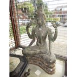 Large green and dark brown patinated bronze figure of seated Buddha on a separate plinth base,