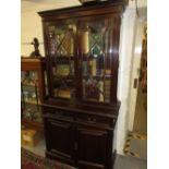 Edwardian mahogany bookcase by Maple and Co.