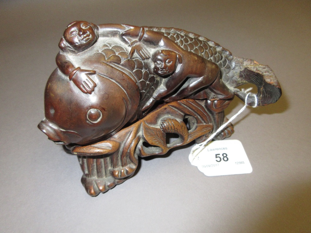 Antique Chinese carved hardwood figure of a carp and two figures mounted on a carved root base