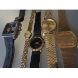 Four various gentlemens wristwatches and a ladies wristwatch