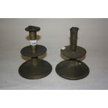 Pair of antique brass candlesticks with low drip trays (a/f)