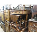 Victorian mahogany two drawer dressing table on shaped end supports with turned stretcher