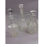 Two 19th Century glass jug decanters with stoppers and another glass decanter with stopper
