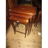 Nest of three Edwardian rectangular mahogany and inlaid occasional tables