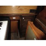 Small early 20th Century oak twin pedestal roll top desk with a tambour top enclosing a fitted