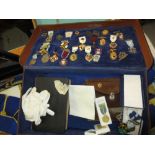 Large quantity of Masonic regalia in three cases and an oak box