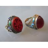 Two Chinese silver gilt enamel decorated rings