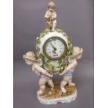 19th Century Continental porcelain floral encrusted mantel clock,