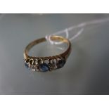 18ct Yellow gold five stone sapphire and diamond ring