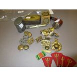 Gilt metal dress stud with concealed compass together with a quantity of military badges and