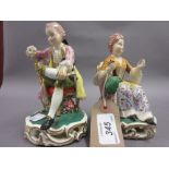 Pair of Derby porcelain figures of a seated lady and gentleman, No.