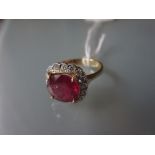 18ct Yellow gold treated ruby and diamond cluster ring