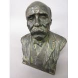 Small 19th Century dark patinated bronze bust of Clemenceau, signed in the bronze ' Pochett ',