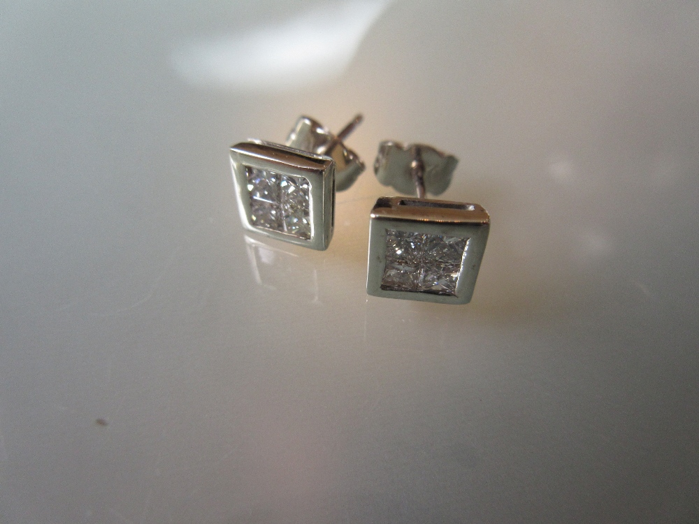 Pair of square white gold ear studs,