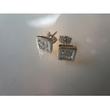 Pair of square white gold ear studs,