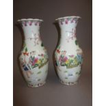 Pair of Chinese baluster form vases painted with children, signed with seal mark to bases,