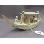 Japanese Meiji period carved ivory covered boat with musicians and other figures (some damages),