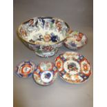 Large Imari circular pedestal fruit bowl together with a quantity of various Imari plates and bowls