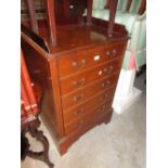 Edwardian mahogany safe cabinet with a single door simulated as five drawers on bracket feet