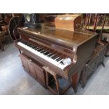 1920's Mahogany cased baby grand piano by Eavestaff raised on square tapering supports