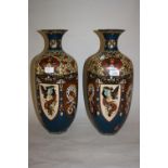 Pair of large Japanese cloisonné baluster form vases decorated with panels of birds, dragons etc,