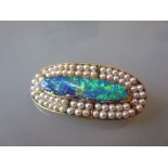 18ct Oval seed pearl and opal set brooch