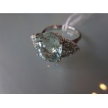 18ct White gold oval aquamarine and diamond ring, the aquamarine approximately 4.