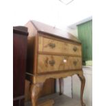 1930's Figured walnut bureau with a fall front above two drawers and cabriole supports