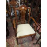 Pair of 19th Century mahogany open elbow chairs with pierced splat backs,