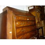 George III figured mahogany and line inlaid bureau,