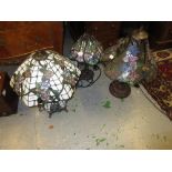 Group of three Tiffany style table lamps
