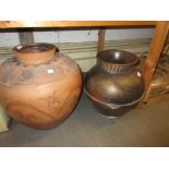 Two late 20th Century terracotta baluster form jars