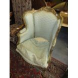 19th Century French carved and gilded composition tub shaped drawing room chair on cabriole front