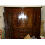 George III figured mahogany breakfront wardrobe,