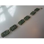 Carved spinage jade six panel bracelet