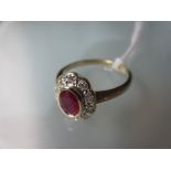 9ct Gold oval ruby and diamond cluster ring