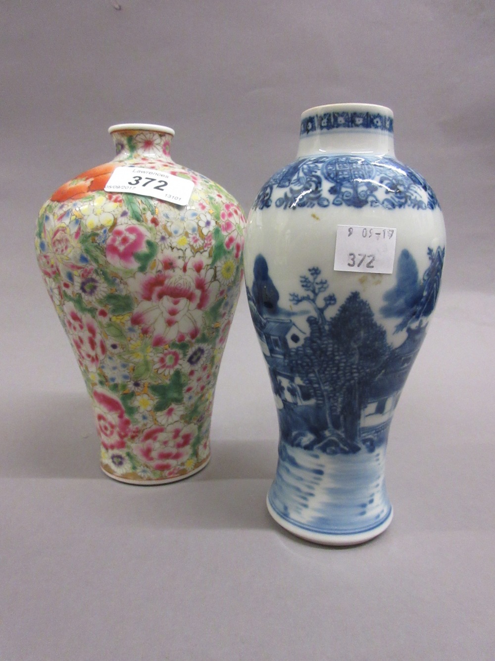 Chinese porcelain baluster form vase with all-over floral decoration, red seal mark to base, 7.