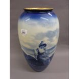 Large Royal Doulton baluster form vase painted in blue and white with a girl seated on rocks on a