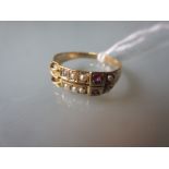 19th Century yellow gold seed pearl and ruby set buckle ring