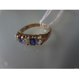 18ct Yellow gold five stone diamond and sapphire ring