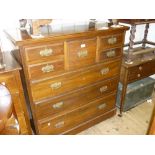 Large late Victorian walnut chest of five short and three long drawers with brass handles