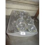 Quantity of Babycham glasses together with a quantity of other drinking glasses