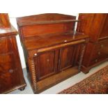 Victorian mahogany chiffonier with an arched shelf back above single drawer and two panelled doors