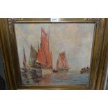 Early 20th Century oil on board, moored sailing vessels with figures in open boats,