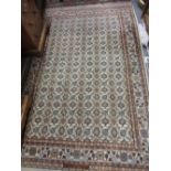 Indo Persian rug of all-over floral design on beige ground,