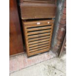 Early to mid 20th Century beechwood collectors cabinet fitted with multiple shallow drawers